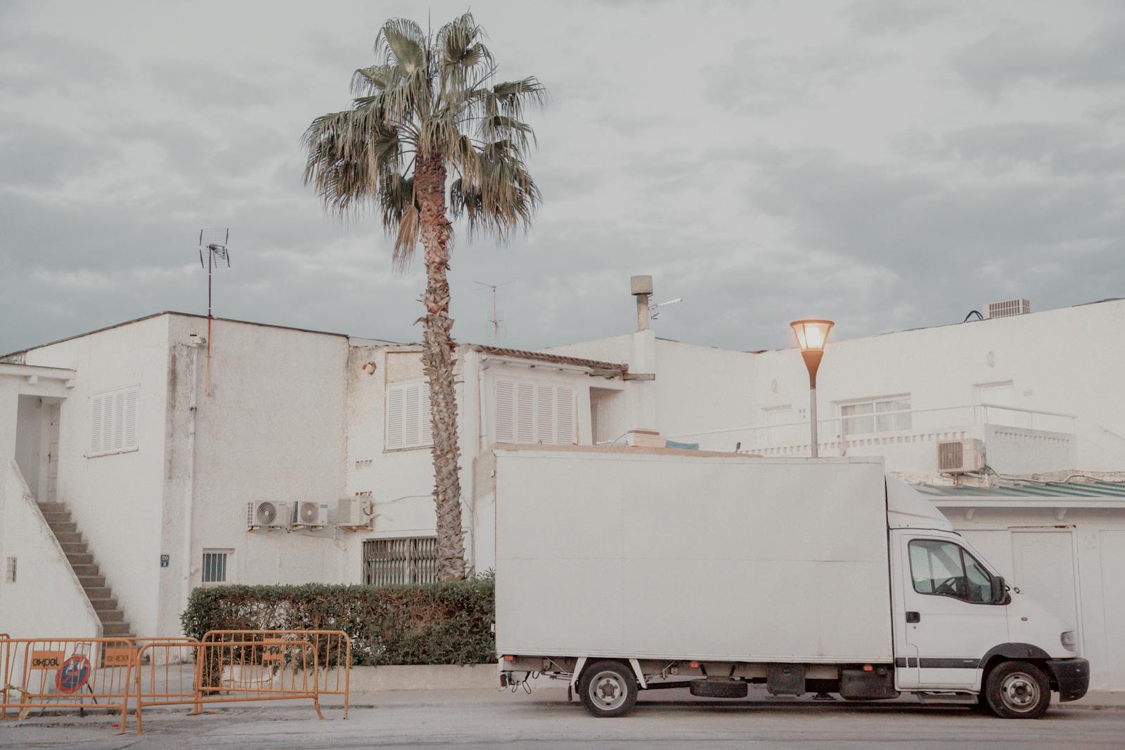 Clean white box truck in service-route territory — Dumpster Breath route distribution vehicle